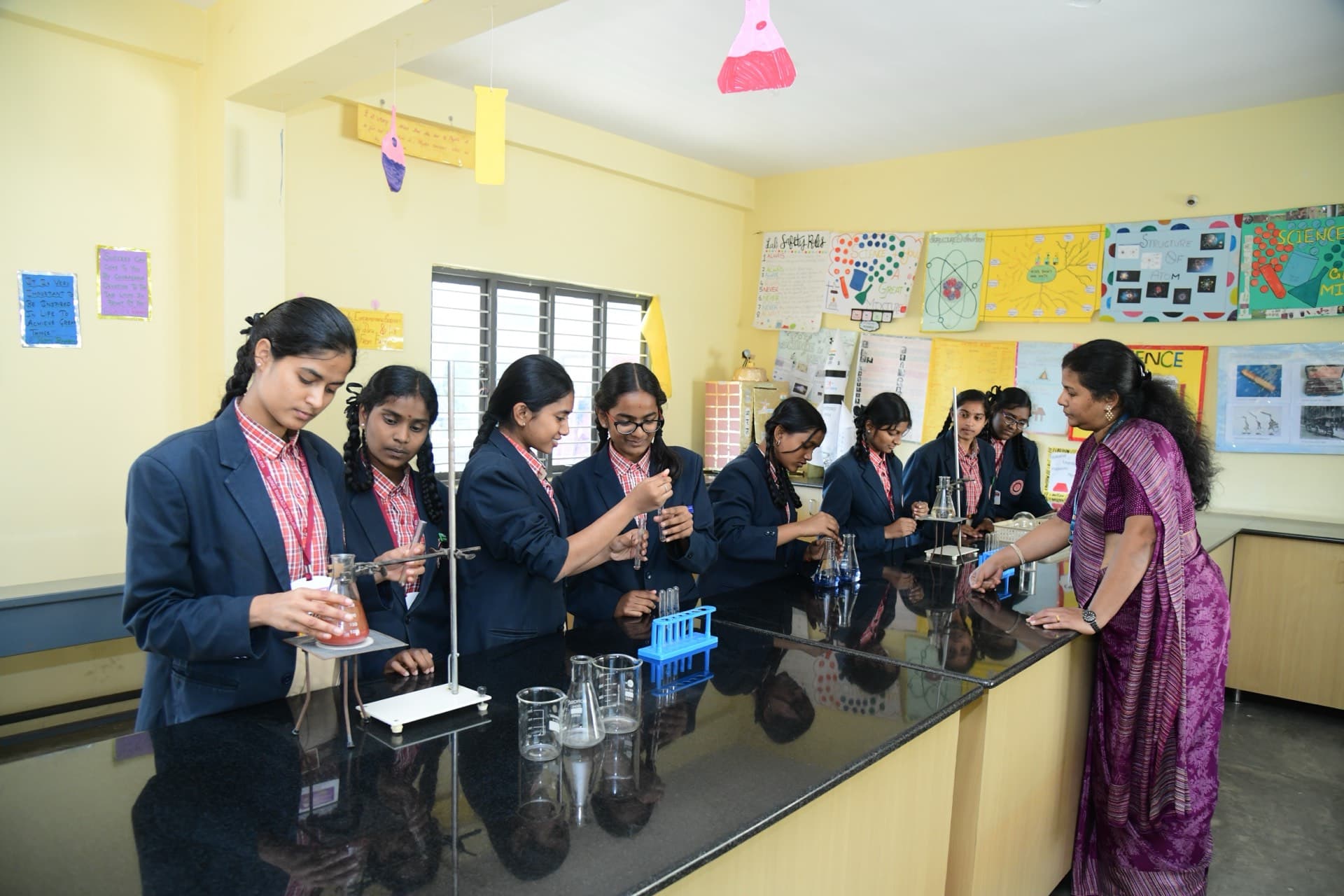 Students conducting chemistry experiments in the SSV laboratory