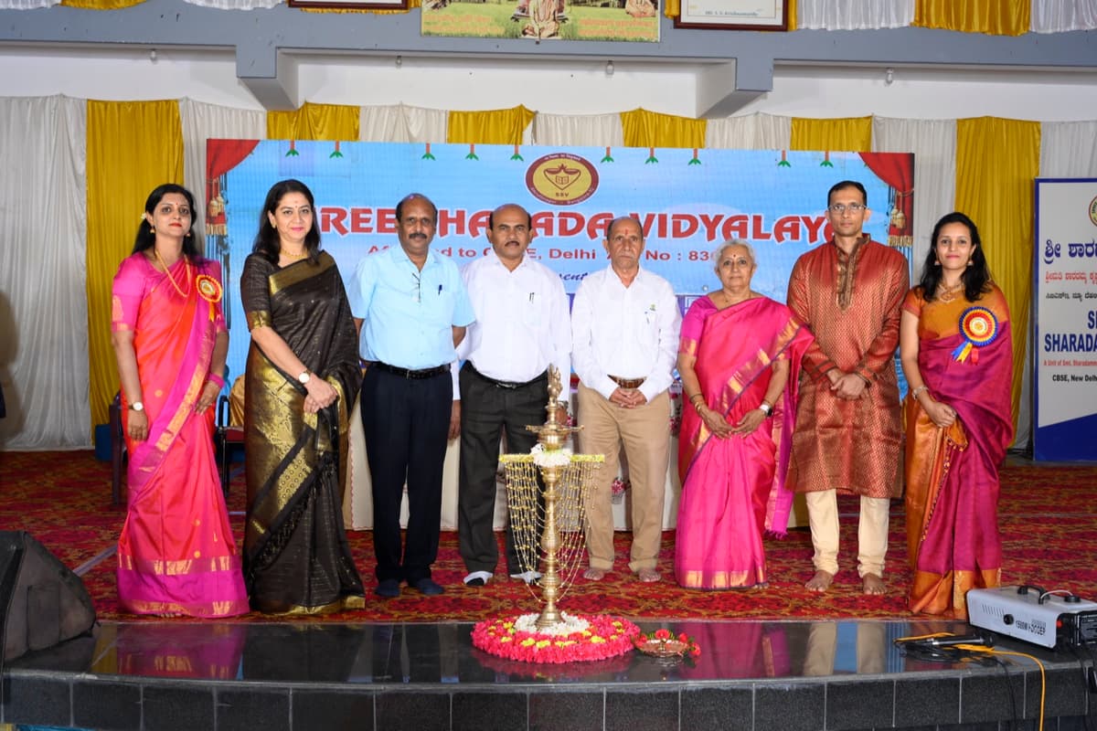 Formal gathering with guests and school leadership, December 2023